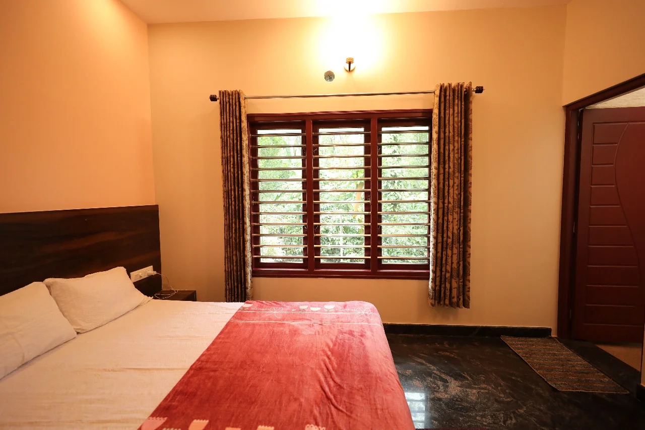 Bedroom with garden view at Galimale Homestay